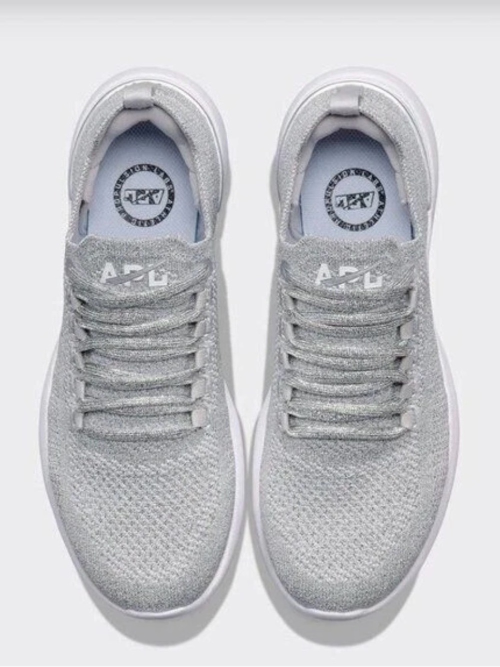 APL Womenās Silver TechLoom Knit Sneakers